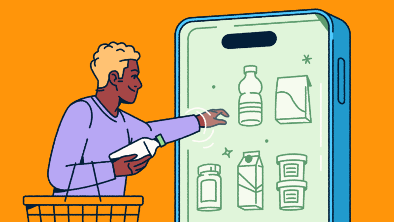 A person holding a shopping basket and selecting consumer packaged goods from a mobile "fridge."