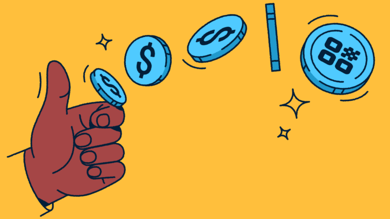 A hand flipping a coin with a QR Code on it.